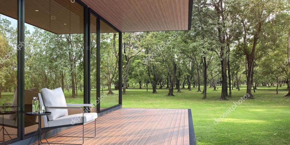 Modern loft style house in a large garden 3d render, There are wooden floor and ceiling, There is a large glass window with a reflection of the surrounding nature. Decorated with white fabric chairs